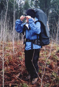 Jane Beckwith cuts an azimuth with her prism-sighting compass