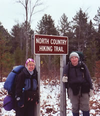 Mary Powell and Mike Ugorowski pause along the North Country Trail