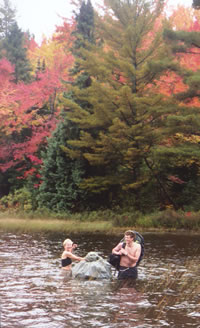 Mary Powell and Aaron Cliff ford a narrows in Island Lake