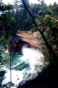 Waves crashing into cliffs near battleship row