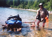 Michael Neiger emerges from a Lake Superior after a 1300 meter swim along a trailless section of coastline